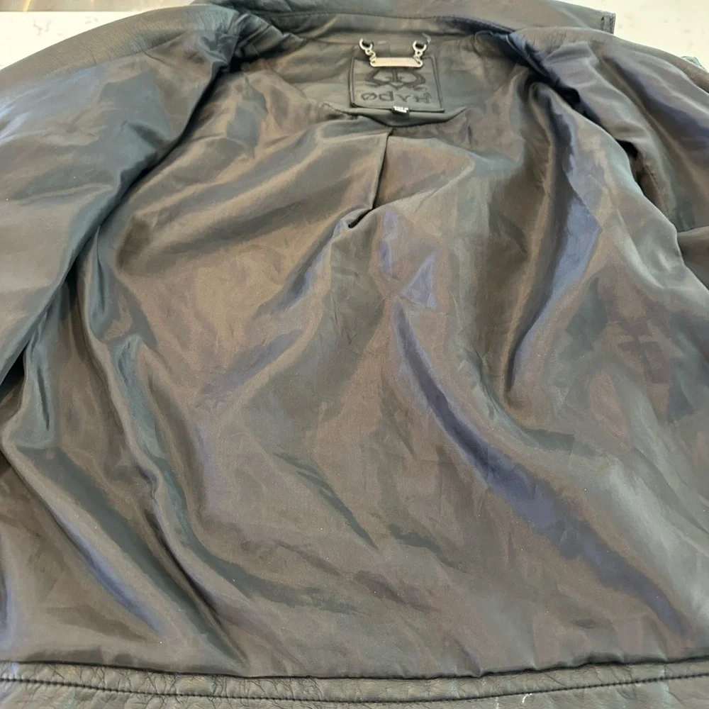 Edgy Moto jacket with studs, perfect layering over jeans or a skirt